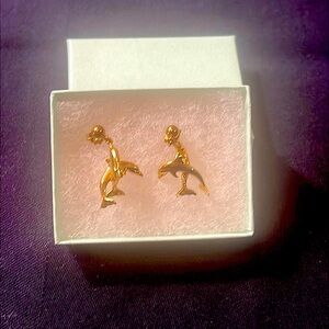 Women’s gold, dangle, dolphin earrings